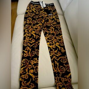 Women’s Versace Black and Gold Leggings Size Small